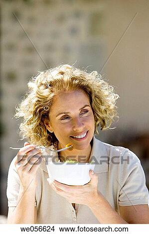 Picture - baby boomer, bowl, absorbed. Fotosearch