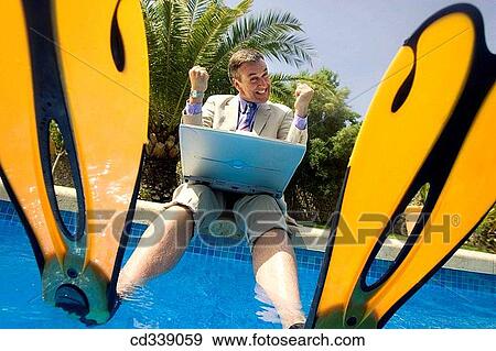 Stock Photo - baby boomer, businessman, business, barefoot, achievement. Fotosearch