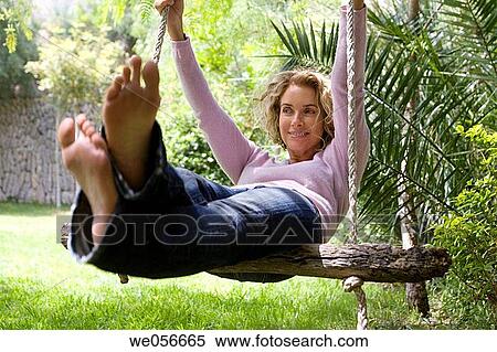 baby boomer, calm, barefoot, absorbed View Large Photo Image Stock Photography - baby boomer, calm, barefoot, absorbed. Fotosearch