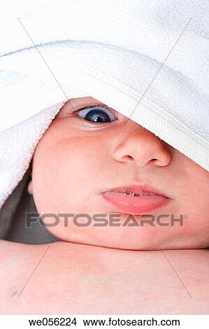 Baby Looking at Camera with Towel over head View Large Photo Image Picture - Baby Looking at Camera with Towel over head. Fotosearch