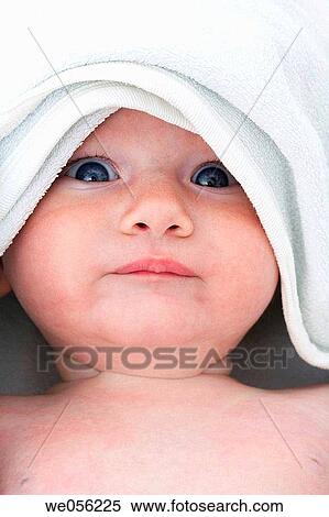 Baby Looking at Camera with Towel over head View Large Photo Image Stock Photography - Baby Looking at Camera with Towel over head. Fotosearch