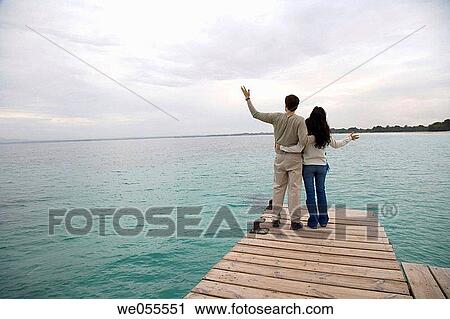 back view, calm, bonding, bond, Arms open View Large Photo Image Stock Image - back view, calm, bonding, bond, Arms open. Fotosearch