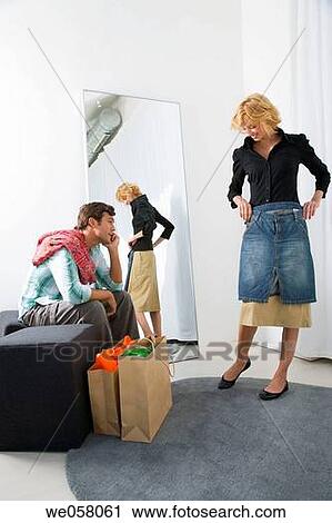 Stock Image - bag, changing-room, choice, choosing. Fotosearch