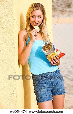bag, chip, blond, absorbed View Large Photo Image Picture - bag, chip, blond, absorbed. Fotosearch