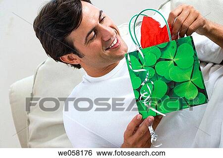 Stock Photograph - bag, contemporary, dark hair. Fotosearch