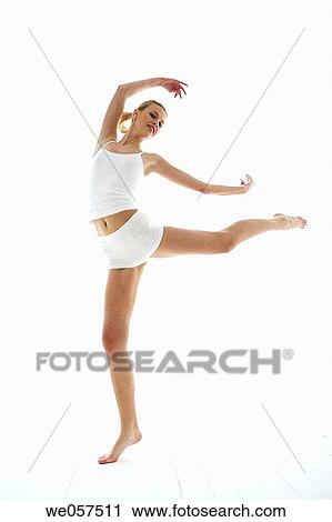 Stock Image - balance, Body language, barefoot, Arms raised. Fotosearch