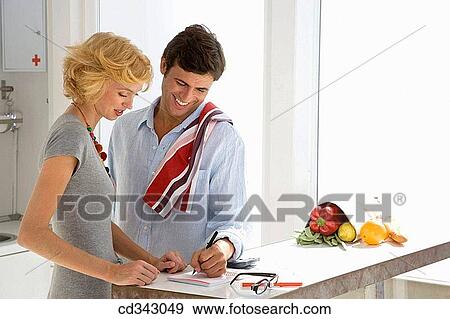 Ball-point pen, calculator, bread, at-home View Large Photo Image Stock Photo - Ball-point pen, calculator, bread, at-home. Fotosearch