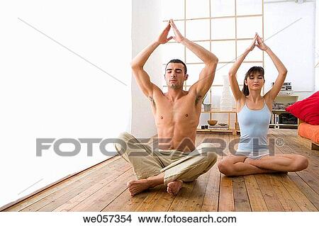 Picture - barefoot, companion, Arms raised. Fotosearch