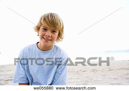 Stock Image - beach, blond, boy, calm. Fotosearch