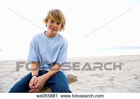 Stock Image - beach, blond, boy, calm. Fotosearch