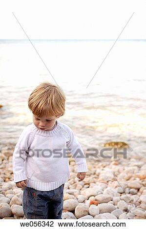 Stock Image - beach, boy, child, childhood. Fotosearch