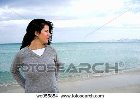 beach, calm, brunette, absorbed View Large Photo Image Picture - beach, calm, brunette, absorbed. Fotosearch