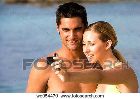 beach, camera, cell phone View Large Photo Image Stock Image - beach, camera, cell phone. Fotosearch