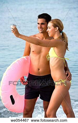 beach, camera, cell phone View Large Photo Image Stock Photo - beach, camera, cell phone. Fotosearch