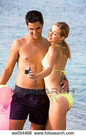 beach, camera, cell phone View Large Photo Image Stock Photo - beach, camera, cell phone. Fotosearch