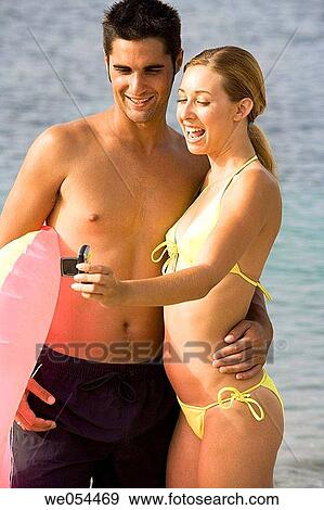 beach, camera, cell phone View Large Photo Image Stock Photo - beach, camera, cell phone. Fotosearch