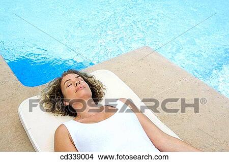 beach chair, calm, chilling out, contemporary, day View Large Photo Image Picture - beach chair, calm, chilling out, contemporary, day. Fotosearch