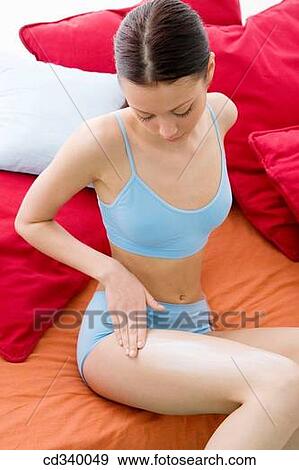 Stock Photo - beauty, brunette, Body care, Beauty Care, apply. Fotosearch