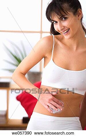 belly, brunette, Body care, apply View Large Photo Image Stock Image - belly, brunette, Body care, apply. Fotosearch