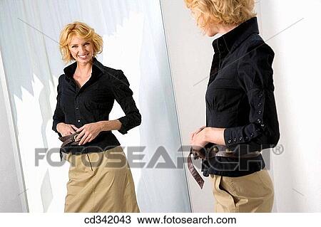 belt, Clothing store, changing-room, accessory View Large Photo Image Stock Image - belt, Clothing store, changing-room, accessory. Fotosearch