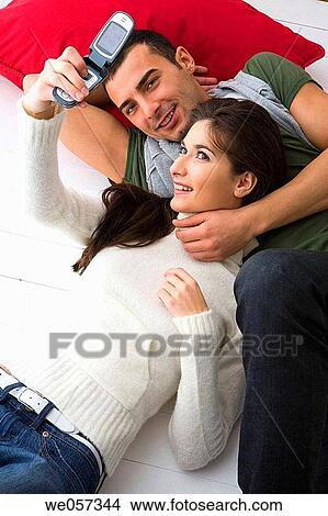 Best friend, caressing, caress, camera, amusement View Large Photo Image Picture - Best friend, caressing, caress, camera, amusement. Fotosearch