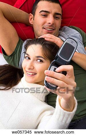Best friend, cell phone, camera, amusement View Large Photo Image Stock Photography - Best friend, cell phone, camera, amusement. Fotosearch