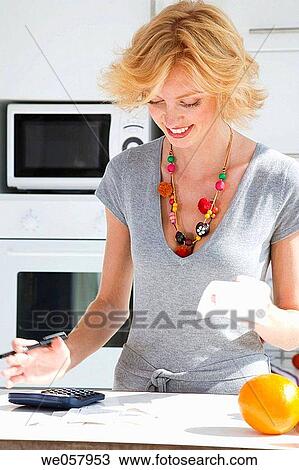 Stock Image - bill, calculation, calculating, calculate, at-home. Fotosearch