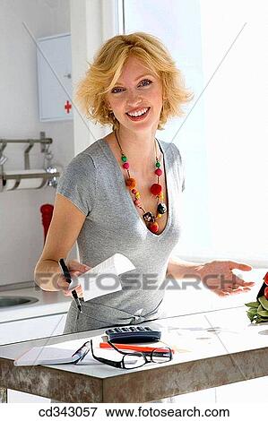 Stock Photo - bill, calculation, calculating, calculate, at-home. Fotosearch