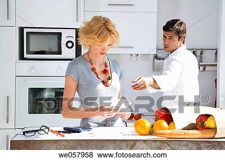 Stock Photo - bill, calculator, bread, at-home. Fotosearch