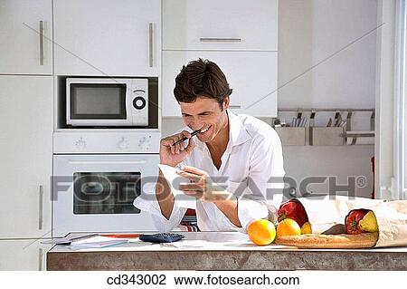 bill, checking, check, at-home View Large Photo Image Stock Image - bill, checking, check, at-home. Fotosearch