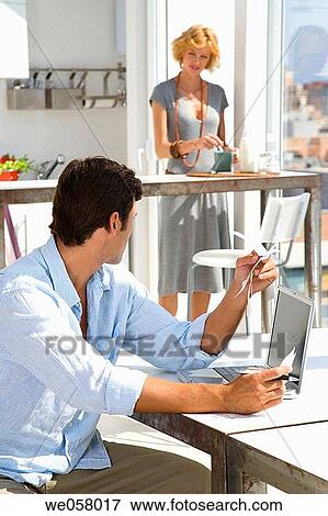 bill, checking, check, at-home View Large Photo Image Stock Photo - bill, checking, check, at-home. Fotosearch