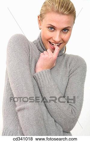 bite, biting, blond, blue eyes View Large Photo Image Stock Photo - bite, biting, blond, blue eyes. Fotosearch
