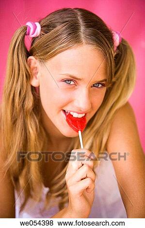 bite, blue eyes, blond, biting, adolescence View Large Photo Image Stock Photo - bite, blue eyes, blond, biting, adolescence. Fotosearch