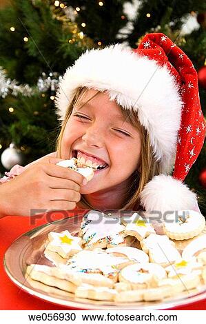 bite, celebration, celebrate, biting, at-home View Large Photo Image Stock Image - bite, celebration, celebrate, biting, at-home. Fotosearch