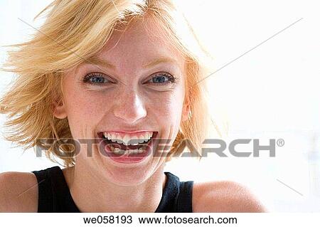 Stock Image - blond, blue eyes, Close-up. Fotosearch