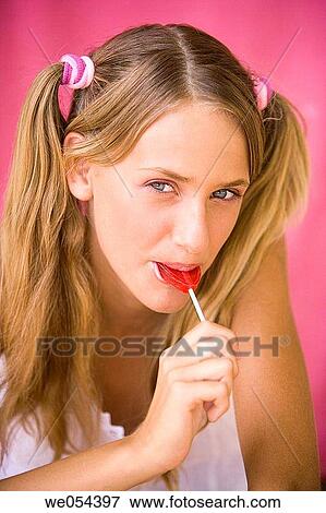 blond, candy, blue eyes, adolescence View Large Photo Image Stock Photo - blond, candy, blue eyes, adolescence. Fotosearch