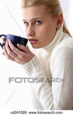 blond, cold, blue eyes, absorbed View Large Photo Image Stock Photo - blond, cold, blue eyes, absorbed. Fotosearch