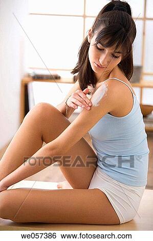 Stock Photograph - Body care, contemporary, apply. Fotosearch