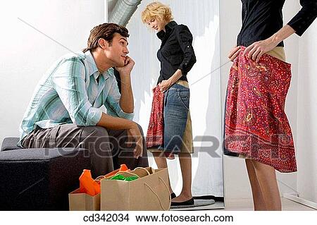 bored, boredom, changing-room, choice View Large Photo Image Picture - bored, boredom, changing-room, choice. Fotosearch