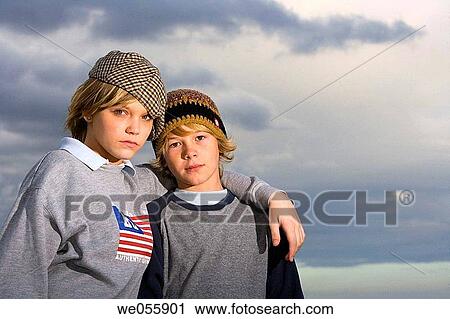 boy, child, cap, brother, autumn View Large Photo Image Stock Image - boy, child, cap, brother, autumn. Fotosearch