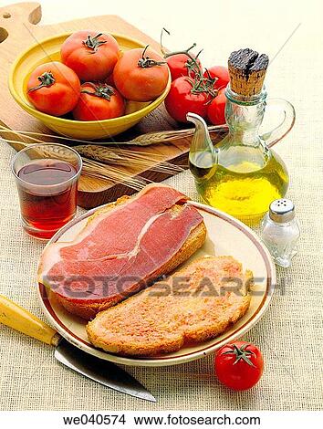 Bread with spread tomatoe and cured ham View Large Photo Image Picture - Bread with spread tomatoe and cured ham. Fotosearch