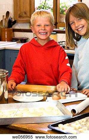 brother, bake, boy, biscuit, baking, at-home View Large Photo Image Stock Photography - brother, bake, boy, biscuit, baking, at-home. Fotosearch