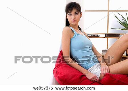 Stock Photography - brunette, calm, at-home. Fotosearch