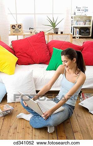 brunette, CD, at-home View Large Photo Image Stock Image - brunette, CD, at-home. Fotosearch