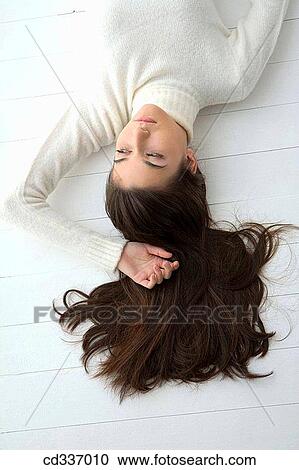 brunette, chilling out, calm, absorbed View Large Photo Image Stock Image - brunette, chilling out, calm, absorbed. Fotosearch