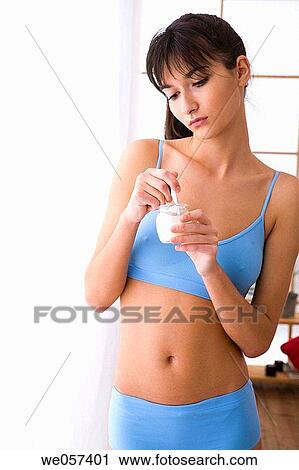 Stock Image - brunette, contemporary, Dairy produce. Fotosearch