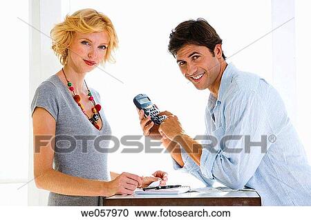 calculate, calculator, calculation, calculating, at-home View Large Photo Image Stock Image - calculate, calculator, calculation, calculating, at-home. Fotosearch
