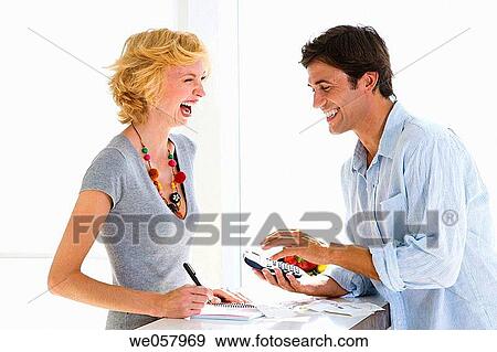 Stock Photo - calculator, contemporary, at-home. Fotosearch