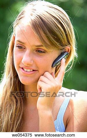 calling, cell phone, adolescence View Large Photo Image Stock Photography - calling, cell phone, adolescence. Fotosearch