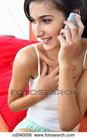 calling, cell phone, at-home View Large Photo Image Stock Photo - calling, cell phone, at-home. Fotosearch